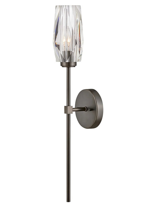 A modern outdoor wall light with a black finish and clear seeded glass featuring a rectangular design.