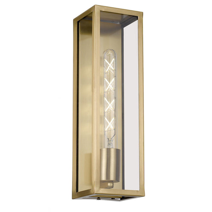 A modern outdoor wall light with an antique bronze finish and a clear cylindrical glass shade.