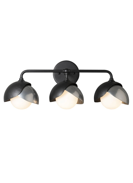 A modern semi-flush mount ceiling fan with a sleek motor and a subtle light kit.