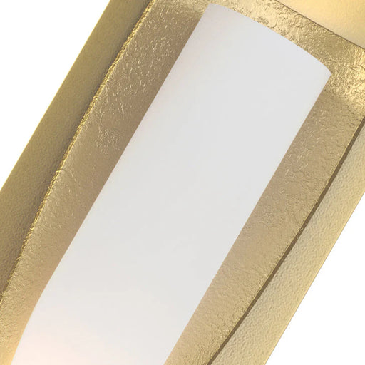A close-up of a modern ceiling fan showing the silver finish of the blades.
