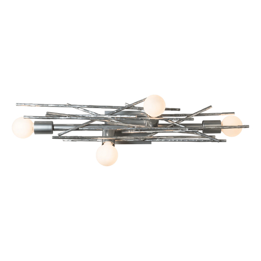 A modern ceiling fan with five dark wood-tone blades and a central light kit.