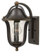 Oil-rubbed bronze outdoor wall light with a traditional lantern design and clear seeded glass.