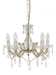 Modern black and brass four-light linear pendant with spherical clear glass shades, side view.