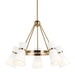 Bronze modern linear chandelier with five cylindrical clear glass shades, angled view.
