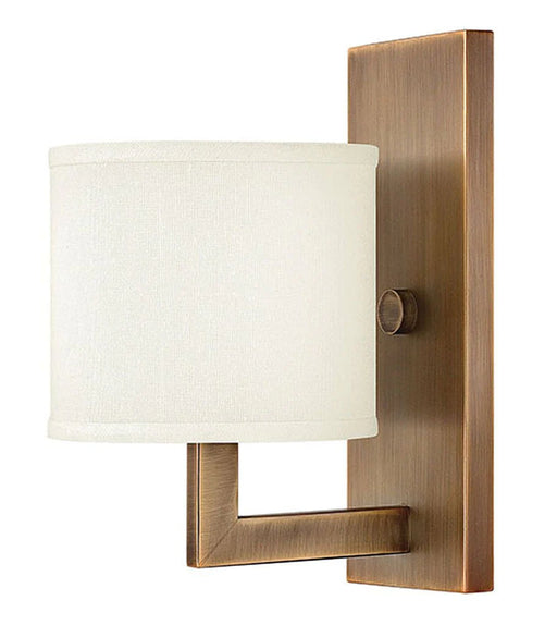 Bronze traditional outdoor wall light with a rectangular shape and clear glass panels.