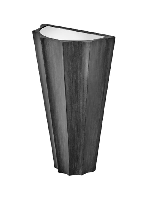A rustic outdoor wall lantern with seeded glass panels and a dark brown finish.