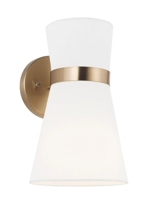 Modern wall sconce with a cylindrical black metal shade and a gold interior, showing internal detail.