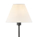 A side view of a small black modern wall light with a frosted glass panel.