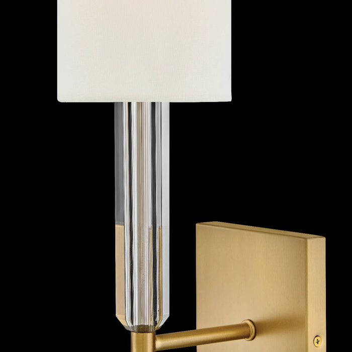 An angled view of a ceiling fan with light wood-tone rectangular blades.