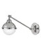 A contemporary linear pendant light with four clear glass shades and a polished nickel finish.