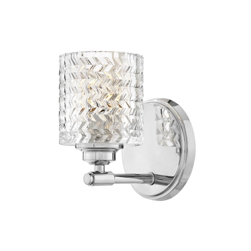 Polished chrome traditional chandelier with multiple arms and white bell-shaped shades.