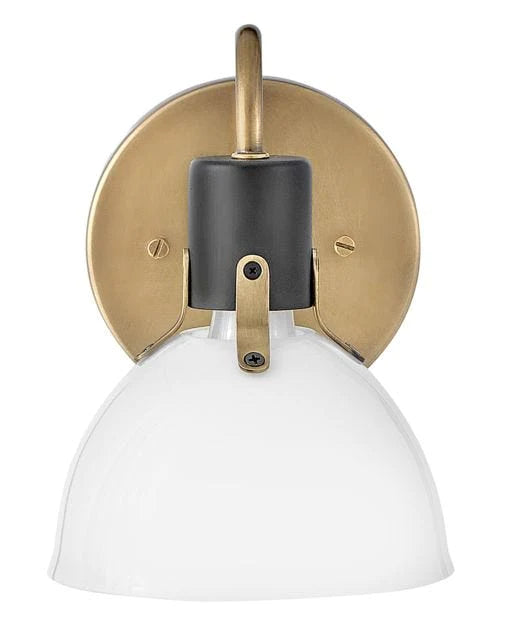 Heritage bronze flush mount ceiling light with a dome-shaped clear glass shade, angled view.
