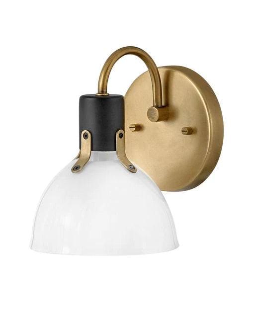 Heritage bronze flush mount ceiling light with a dome-shaped clear glass shade.
