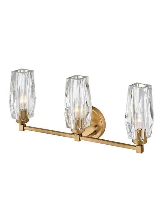 An angled view of a modern dark bronze outdoor wall light with seeded glass.
