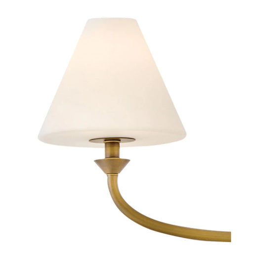 A close-up of a dark bronze open-cage wall light showcasing its linear details.
