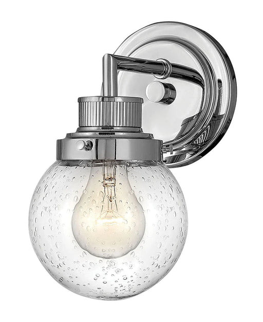 Polished chrome modern chandelier with multiple arms and spherical glass shades.
