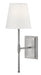 A traditional outdoor wall light with an antique nickel finish and clear seeded glass panels.