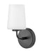 Black bathroom vanity light with three spherical white glass shades.
