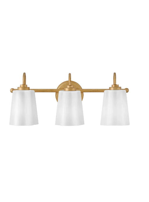 A large modern outdoor sconce in a dark architectural bronze finish with a clear glass panel.