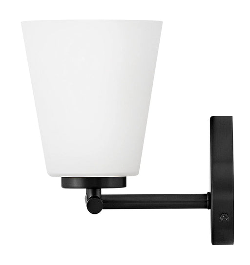 An angled view of a modern black outdoor wall lantern.