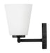 An angled view of a modern black outdoor wall lantern.