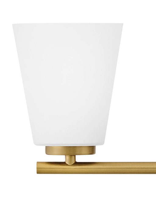 An angled view of a modern light bronze outdoor wall lantern.