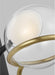 A close-up of a black and brass wall sconce highlighting the texture of the shade and the brass finish.