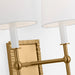 A close-up of a modern brushed steel flush mount light.
