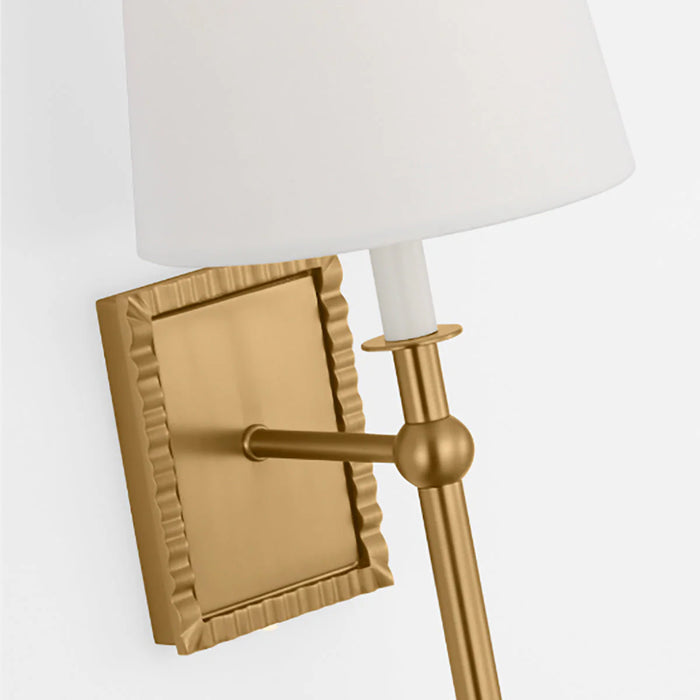 An angled view of a modern black circular flush mount light.