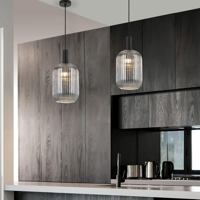 Black and smoky gray 14-light pendant with spherical frosted shades, illuminated.