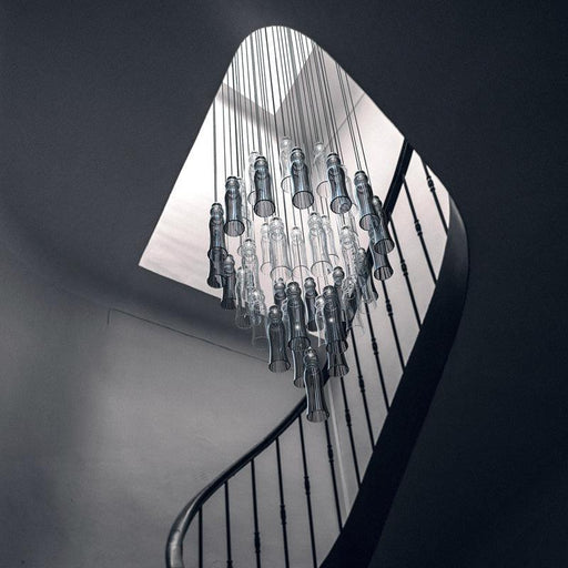 Large, modern wall sconce with a rectangular, metallic frame, angled view.