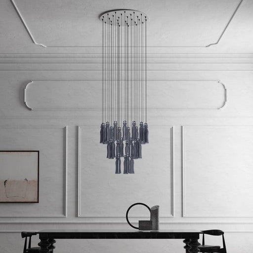Large, modern wall sconce with a rectangular, metallic frame and a central light bar.