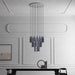 Large, modern wall sconce with a rectangular, metallic frame and a central light bar.