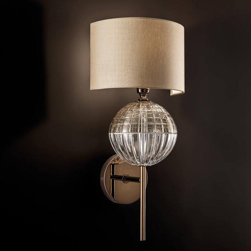 Large, modern wall sconce with a rectangular, metallic frame, angled view.