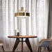 Large, modern wall sconce with a rectangular, metallic frame and a central light bar.