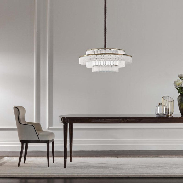 Large, modern wall sconce with a rectangular, metallic frame, angled view.