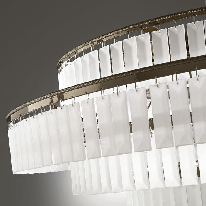 Large, modern wall sconce with a rectangular, metallic frame, side view.
