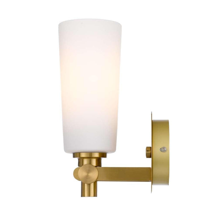 Aged gold outdoor wall sconce with an opal glass panel, side view.