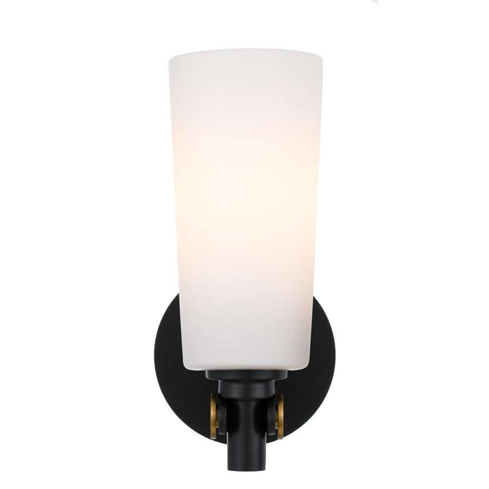 Black outdoor wall sconce with an opal glass panel, illuminated.