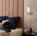 Cropped view of a nickel outdoor wall sconce with an opal glass panel.