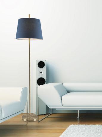 Blue and aged bronze floor lamp with a spherical glass shade, illuminated.