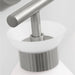A side view of a brushed steel circular flush mount light.