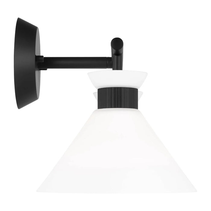 An angled view of a matte black circular flush mount light.