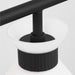 A close-up of a matte black circular flush mount light showing the diffuser.