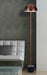 Black floor lamp with a dome-shaped shade and a bronze base, cropped view.