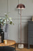 White floor lamp with a dome-shaped shade and a white terrazzo base, cropped view.