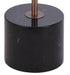 Close-up of the black and bronze base of a floor lamp.