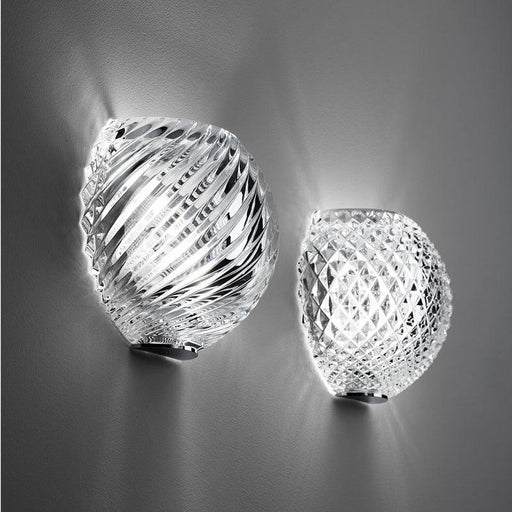 Large, modern wall sconce with a rectangular, metallic frame and a central light bar.