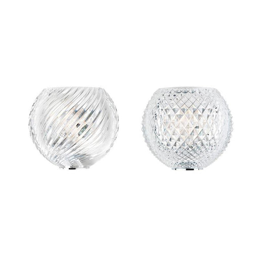 Large, modern wall sconce with a rectangular, metallic frame, angled view.