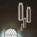 Large, modern wall sconce with a rectangular, metallic frame and a central light bar.